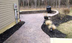 Masonry Landscaping Wall and Stamped Concrete Walkway